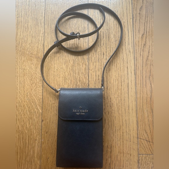 kate spade Handbags - Kate Spade Black Leather Phone Bag in mint condition